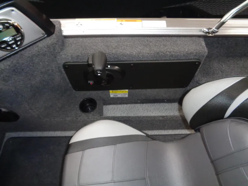 Slide: The Image of Interior of 2024 Lund 1775 Impact XS boat with control panel and seating. - 16