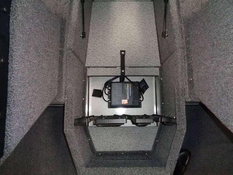 Slide: The Image of 2024 Lund 1775 Impact XS boat interior storage compartment. - 23