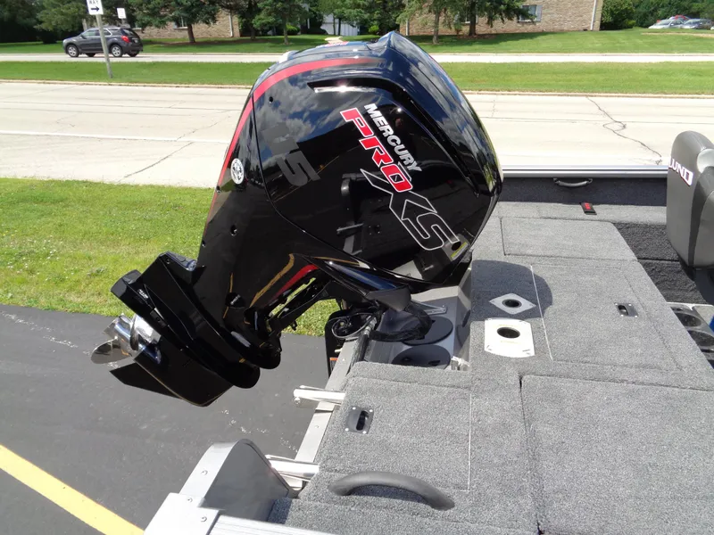 Slide: The Image of 2024 Lund 1775 Impact XS boat with Mercury Pro XS outboard motor. - 26