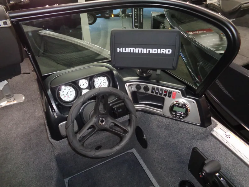 Slide: The Image of 2024 Lund 1775 Impact XS boat dashboard with Humminbird fish finder. - 28