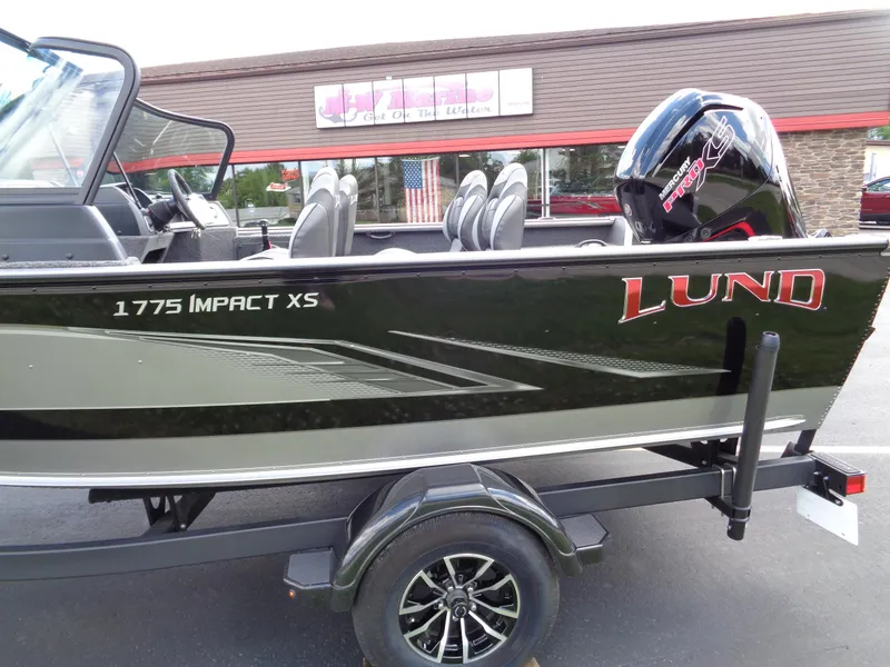 Slide: The Image of 2024 Lund 1775 Impact XS fishing boat on trailer, side view. - 3