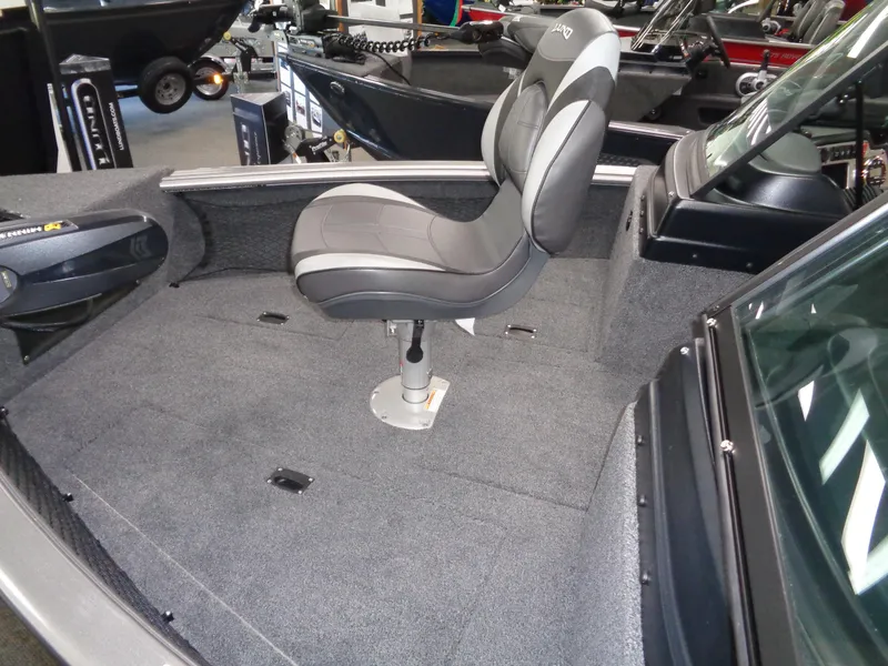 Slide: The Image of 2024 Lund 1775 Impact XS boat interior with a single swivel seat. - 5