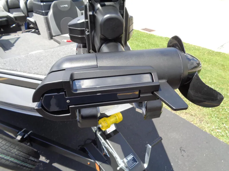 Slide: The Image of 2024 Lund 1775 Impact XS boat motor close-up on trailer. - 14