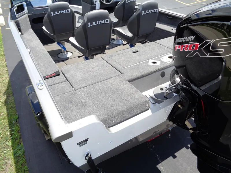 Slide: The Image of 2024 Lund 1775 Impact XS boat interior with Mercury Pro XS engine. - 7