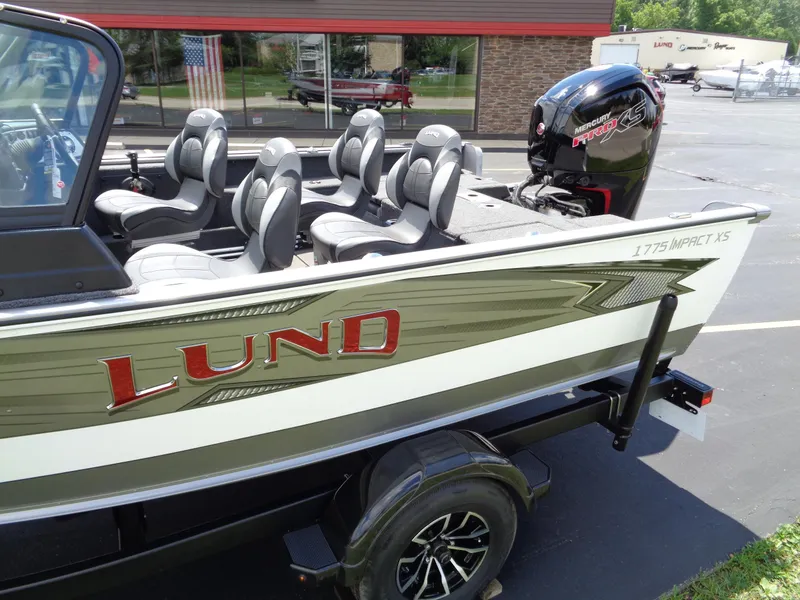 Slide: The Image of 2024 Lund 1775 Impact XS fishing boat with Mercury outboard motor. - 8