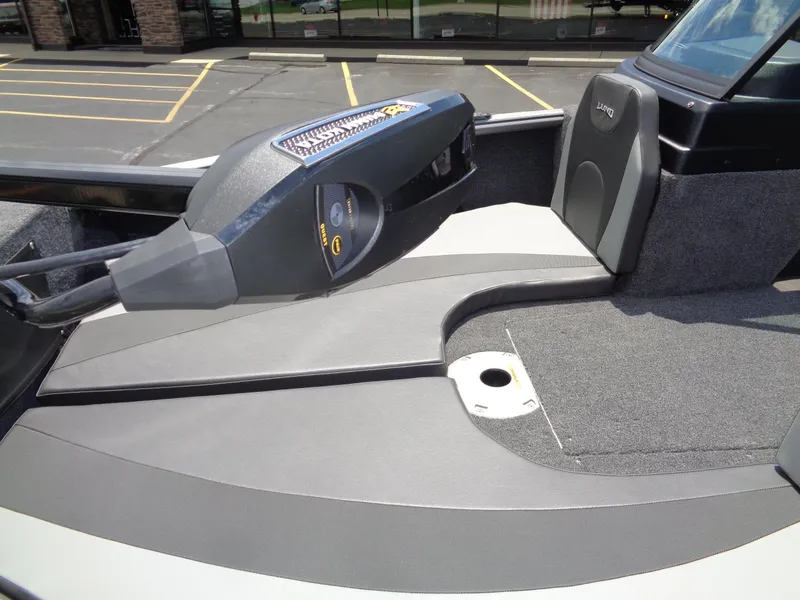 Slide: The Image of 2024 Lund 1775 Impact XS boat interior with trolling motor. - 9