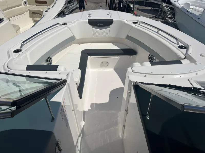 Slide: The Image of 2024 Robalo R317 Dual Console boat interior, spacious seating area. - 16
