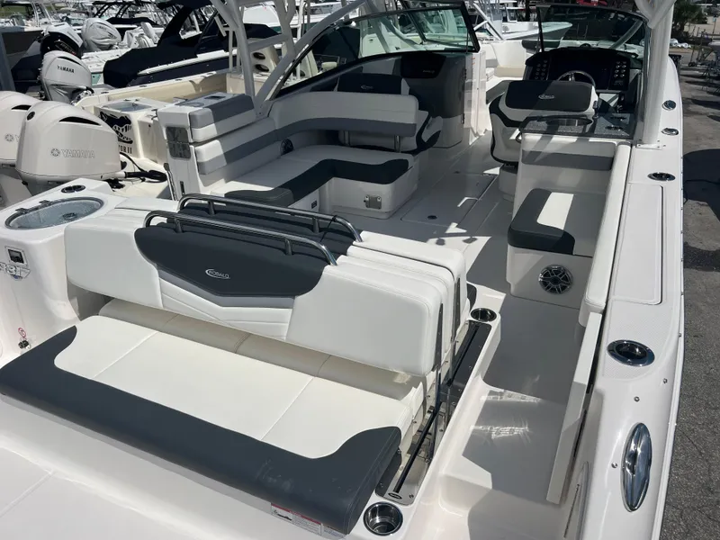 Slide: The Image of 2024 Robalo R317 Dual Console boat interior with seating and console. - 7