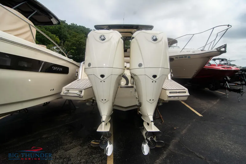 Slide: The Image of 2024 Invictus TT280S boat with dual outboard engines at Big Thunder Marine. - 2