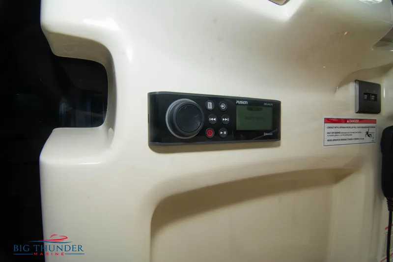 Slide: The Image of Control panel of 2024 Invictus TT280S boat with Fusion audio system. - 20