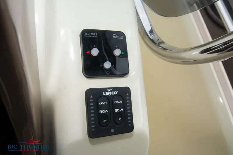 Slide: The Image of Control panel of the 2024 Invictus TT280S boat with Lenco and Quick controls. - 23
