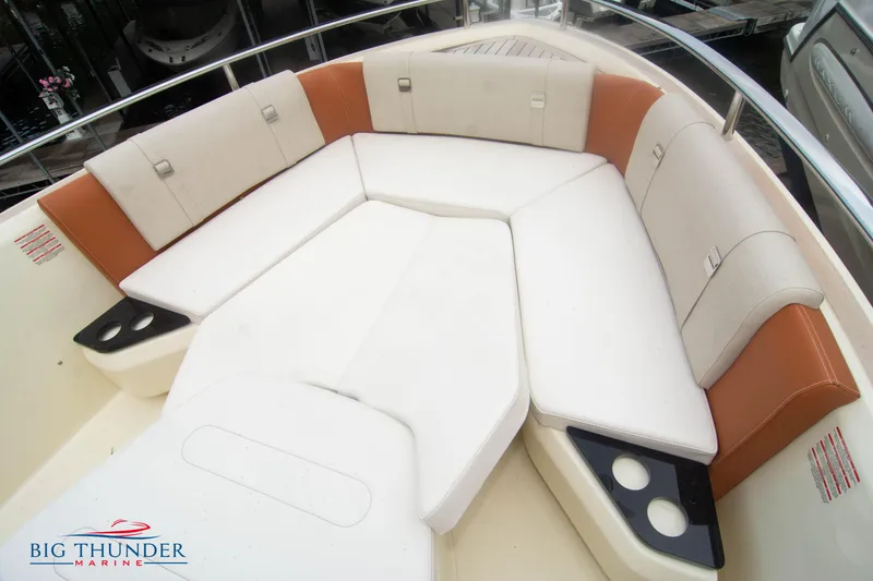 Slide: The Image of 2024 Invictus TT280S boat with spacious seating area and cup holders at Big Thunder Marine. - 31