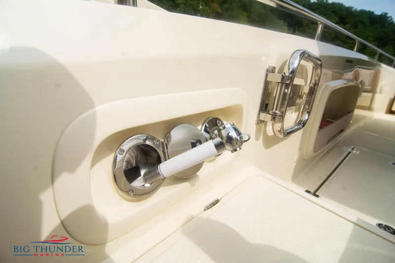 Slide: The Image of Close-up of the 2024 Invictus TT280S boat's deck details and fixtures. - 5