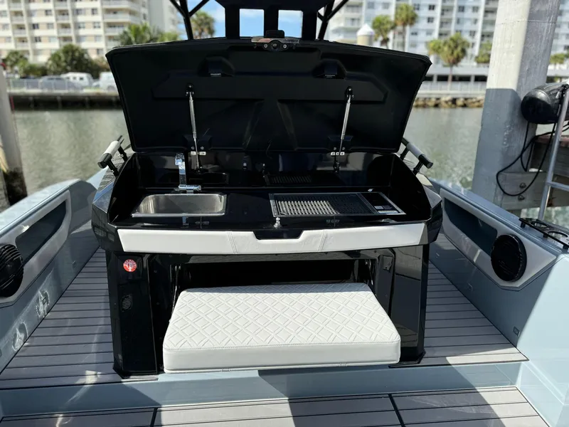 Slide: The Image of 2025 Ranieri CAYMAN 38.0 EXECUTIVE boat with open deck kitchen and seating. - 10