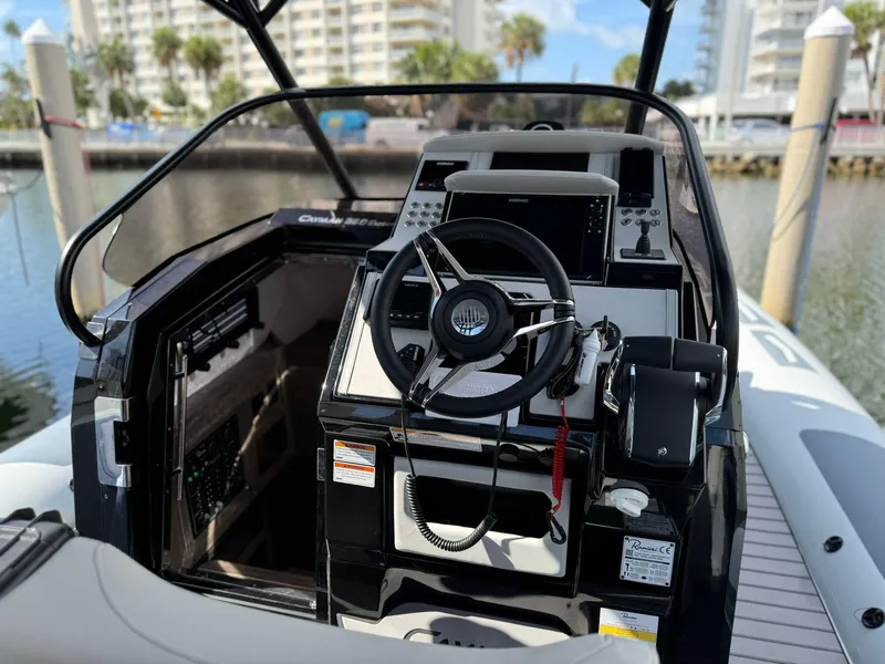 Slide: The Image of Cockpit of 2025 Ranieri CAYMAN 38.0 EXECUTIVE boat docked at marina. - 15