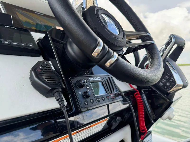 Slide: The Image of Close-up of the 2025 Ranieri CAYMAN 38.0 EXECUTIVE boat's steering console. - 19