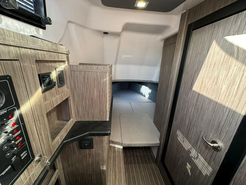 Slide: The Image of Interior cabin of 2025 Ranieri CAYMAN 38.0 EXECUTIVE boat with modern wood finish. - 23