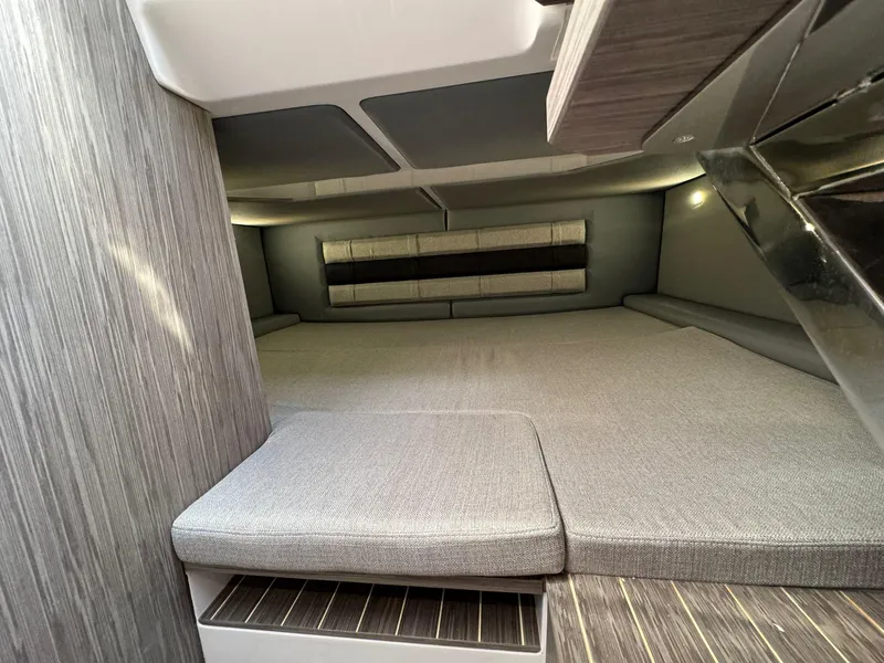 Slide: The Image of Interior cabin of 2025 Ranieri CAYMAN 38.0 EXECUTIVE boat with modern grey upholstery. - 34