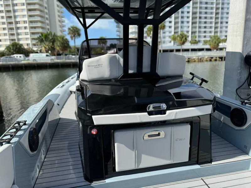 Slide: The Image of 2025 Ranieri CAYMAN 38.0 EXECUTIVE boat docked near waterfront buildings. - 45