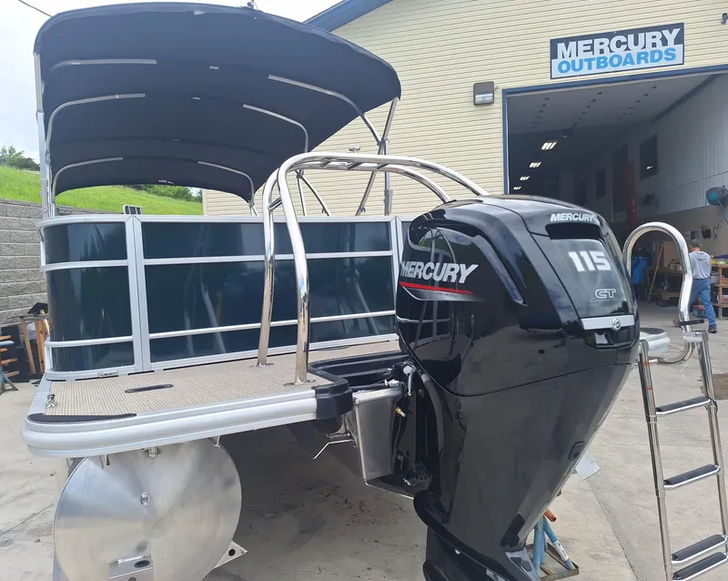 Slide: The Image of 2024 Starcraft EX 22 Weekender boat with Mercury 115 outboard motor. - 5