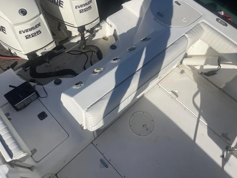 Slide: The Image of Boston Whaler 260 Outrage 2000 boat deck with Evinrude 225 engines. - 11