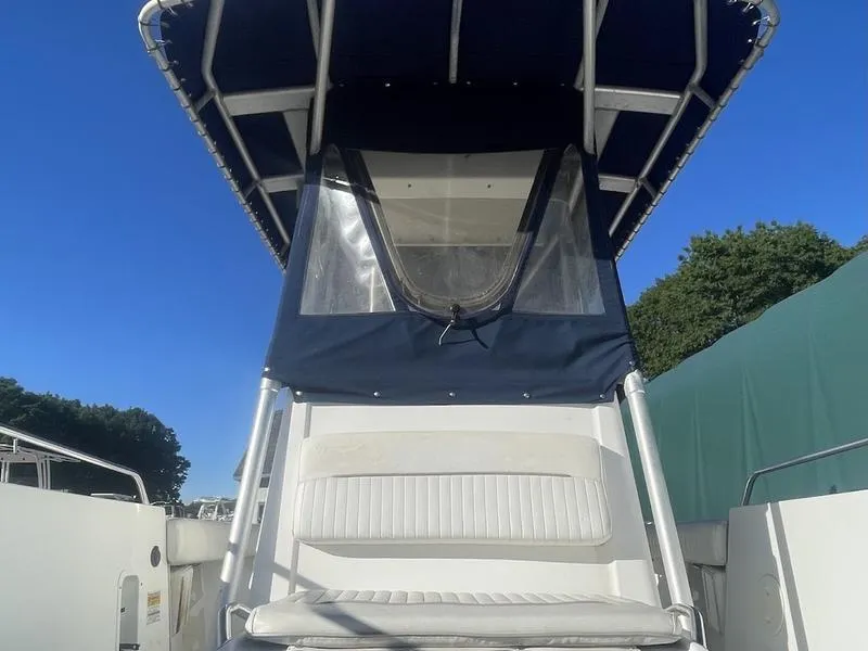 Slide: The Image of Boston Whaler 260 Outrage 2000 boat with canopy, viewed from the deck. - 5