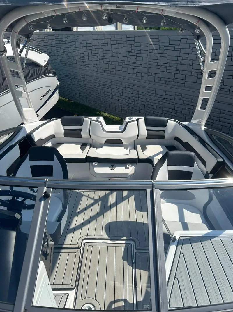 Slide: The Image of 2021 Yamaha Boats 195S interior with sleek seating and modern design. - 5