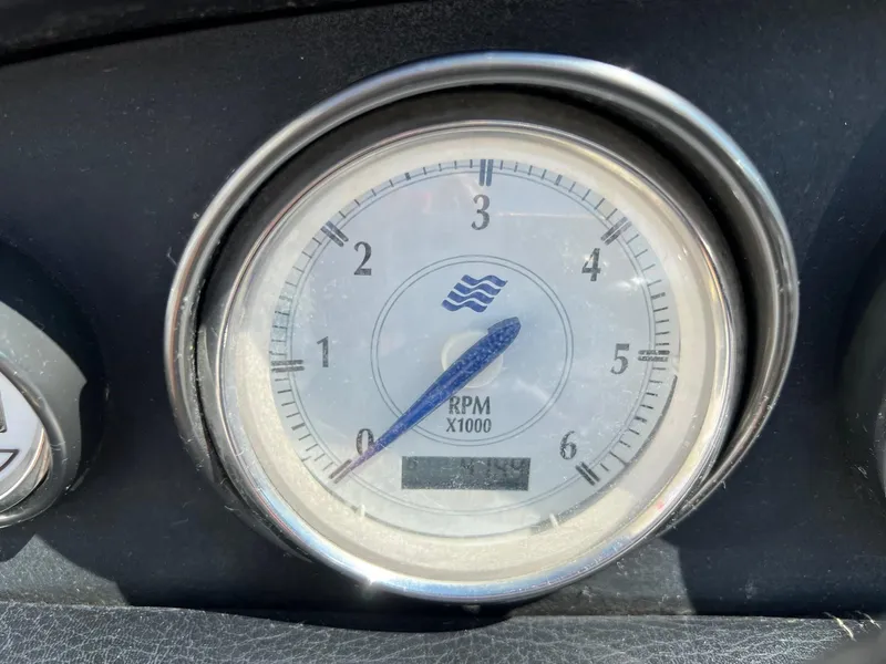 Slide: The Image of Close-up of RPM gauge on 2008 Four Winns H200 boat dashboard. - 10