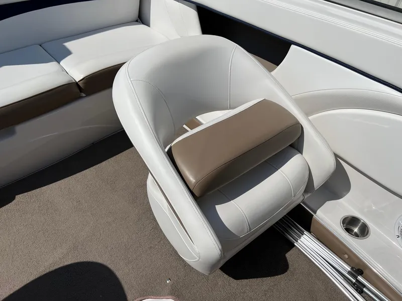 Slide: The Image of 2008 Four Winns H200 boat interior with white and brown seating. - 14