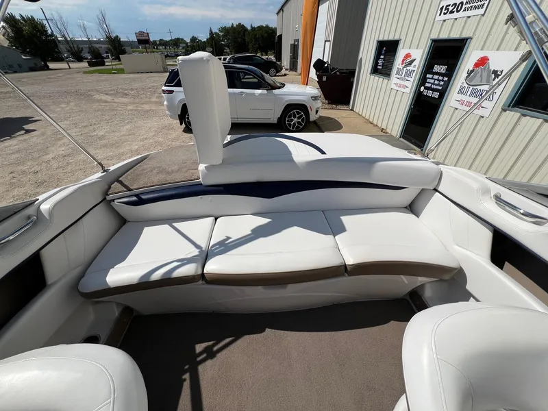 Slide: The Image of 2008 Four Winns H200 boat interior with white leather seating. - 16