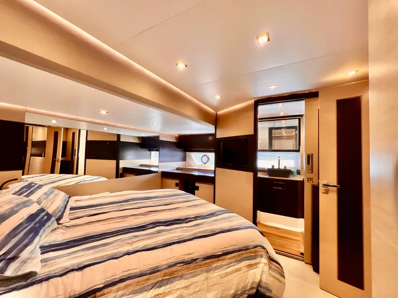 Slide: The Image of Luxurious bedroom interior of 2022 OKEAN Flybridge 50 yacht with modern design. - 16