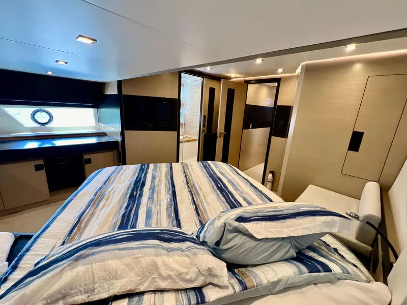 Slide: The Image of Luxurious bedroom interior of 2022 OKEAN Flybridge 50 yacht with modern design. - 17