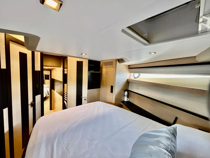 Slide: The Image of Luxurious bedroom interior of 2022 OKEAN Flybridge 50 yacht with modern design. - 24