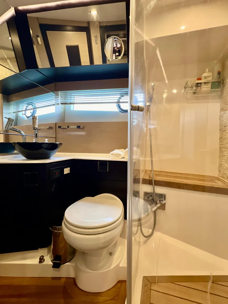 Slide: The Image of Modern bathroom in 2022 OKEAN Flybridge 50 yacht with shower and toilet. - 27