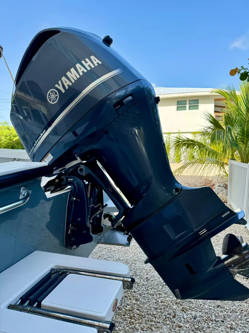 Slide: The Image of Yamaha outboard motor on a 2020 Rambo 27 boat. - 15