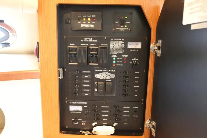 Slide: The Image of Electrical control panel on a 2005 Cruisers Yachts 280 CXi Express. - 23