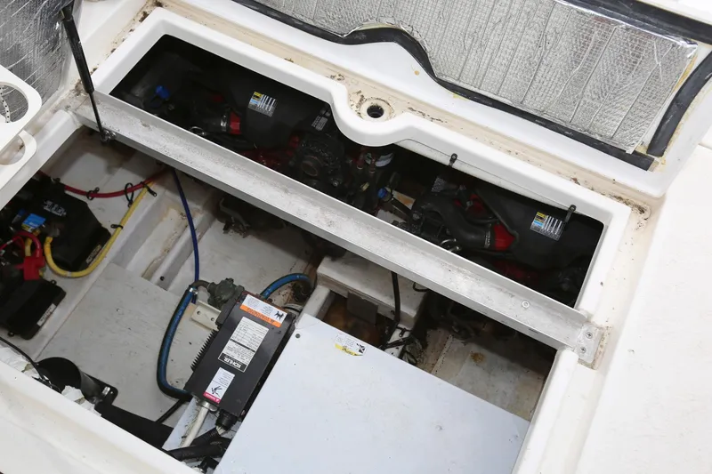 Slide: The Image of Engine compartment of a 2005 Cruisers Yachts 280 CXi Express. - 24