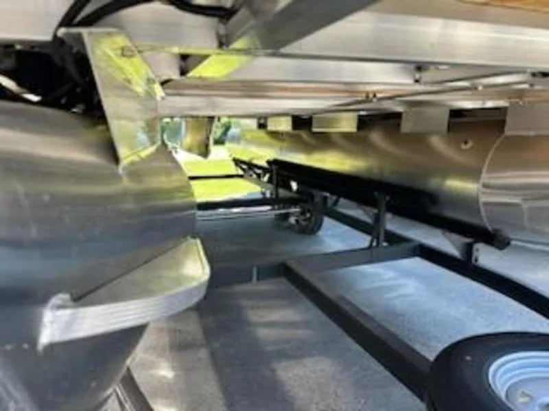 Slide: The Image of 2024 Sun Tracker SF 20 DLX pontoon boat undercarriage view, showcasing structural details. - 4