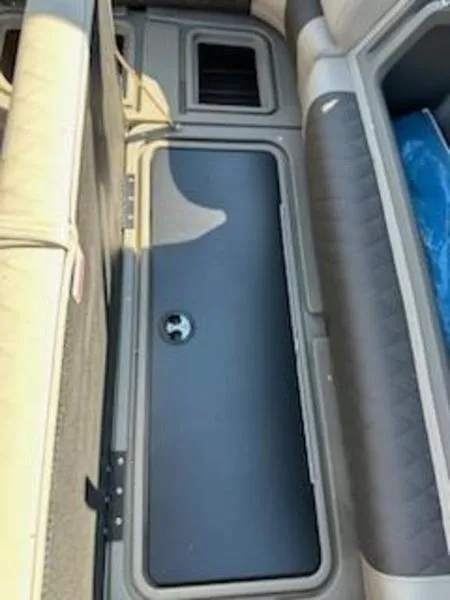 Slide: The Image of 2024 Sun Tracker SF 20 DLX boat interior storage compartment. - 6