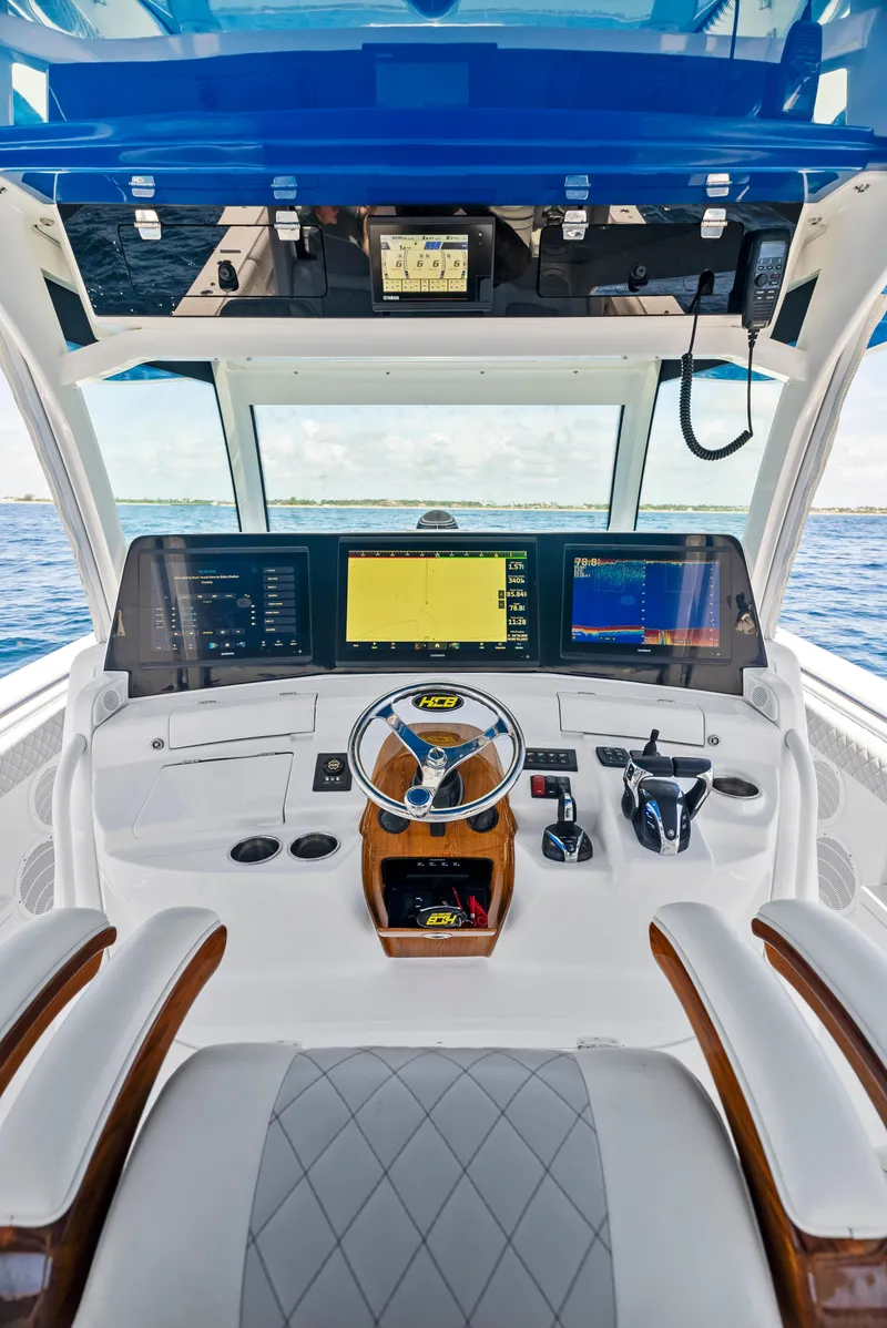 Slide: The Image of 2022 HCB Suenos boat cockpit with advanced navigation systems and luxurious seating. - 20