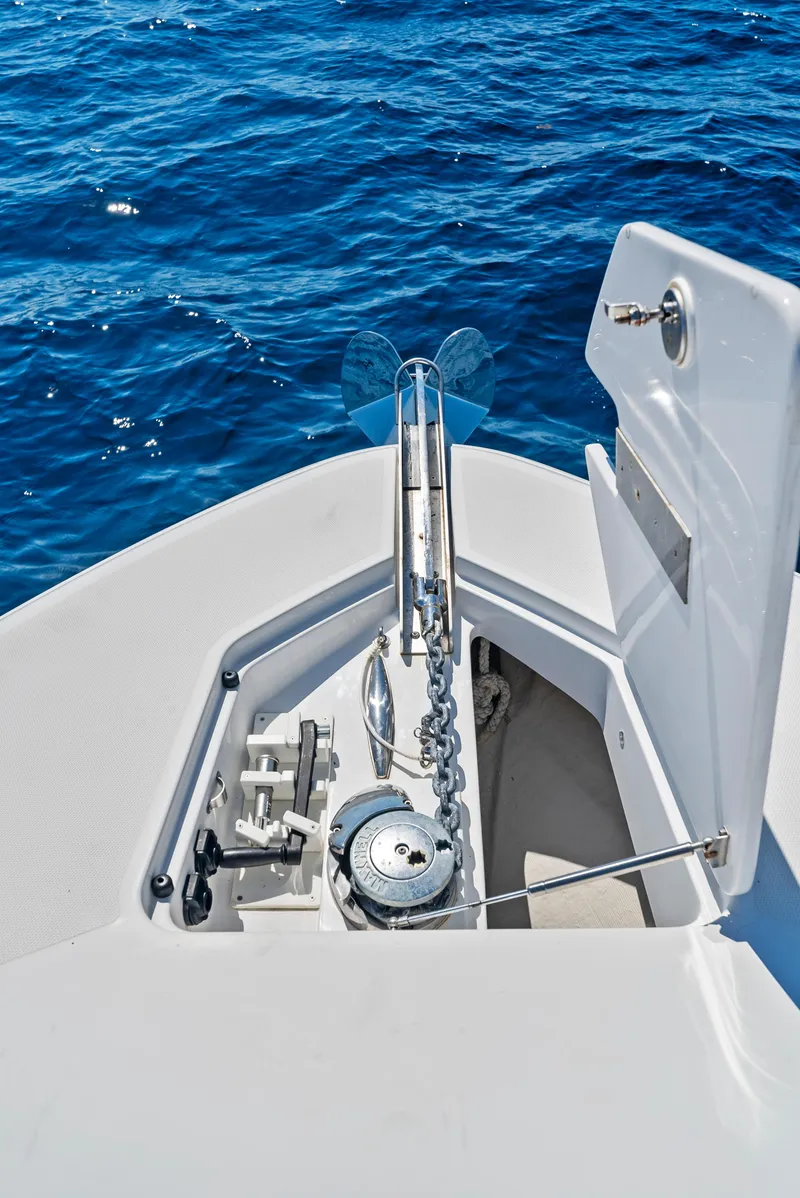 Slide: The Image of 2022 HCB Suenos boat anchor system on blue ocean water. - 7