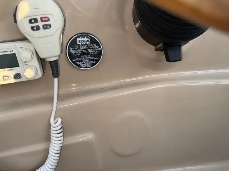 Slide: The Image of Control panel of a 2011 Glastron GS 289 boat with communication device. - 28