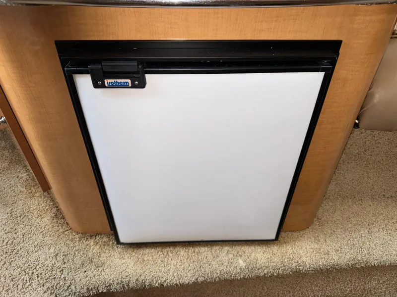 Slide: The Image of Compact refrigerator in 2011 Glastron GS 289 boat interior. - 43