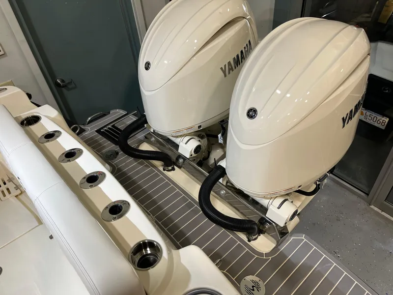 Slide: The Image of 2025 Scout 260 LXF boat with twin Yamaha engines. - 11