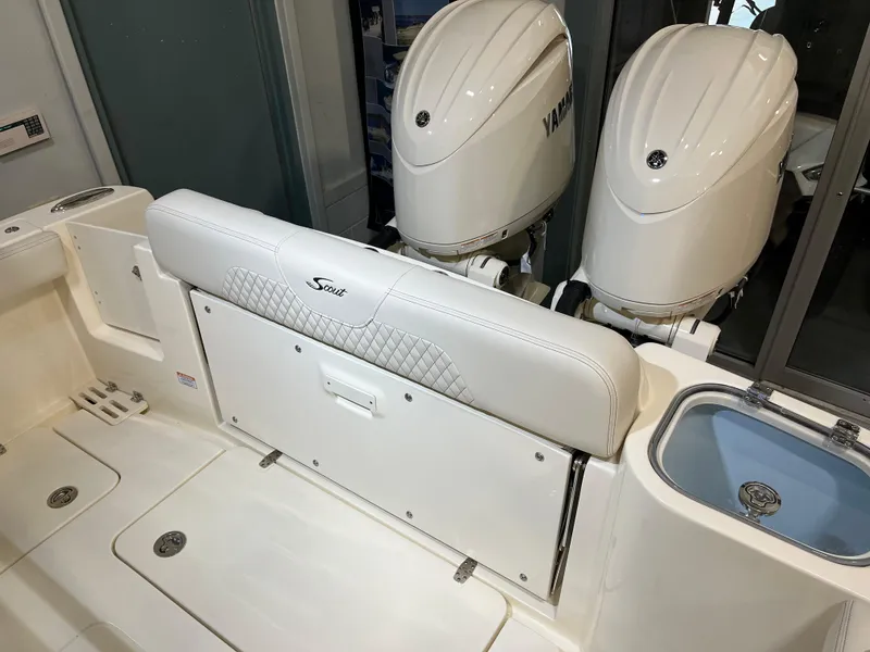 Slide: The Image of 2025 Scout 260 LXF boat with Yamaha engines and white leather seating. - 3