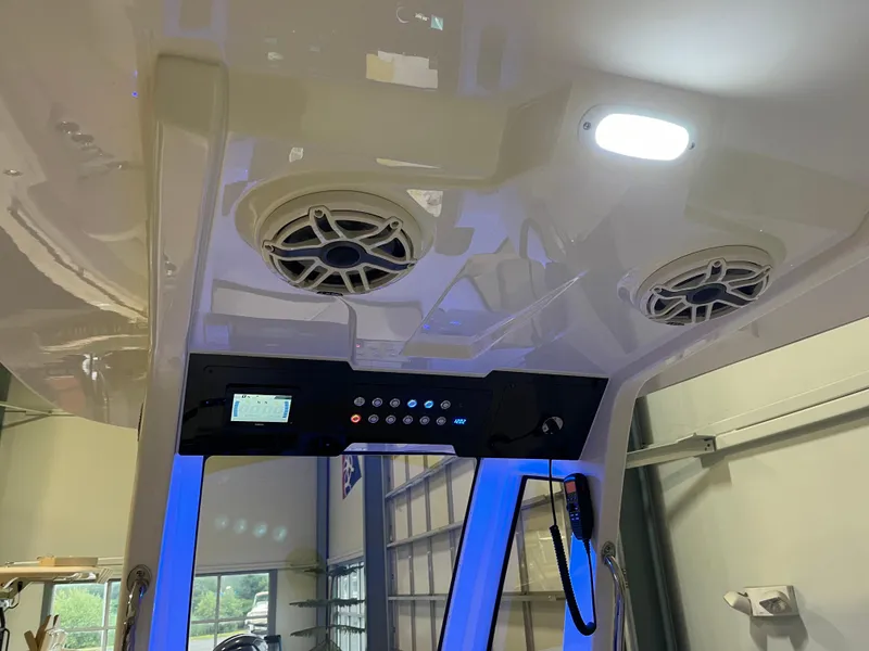 Slide: The Image of 2025 Scout 260 LXF boat interior with speakers and control panel. - 6