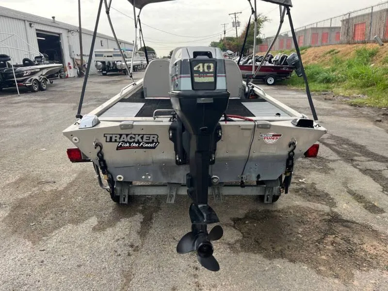 Slide: The Image of 1990 Bass Tracker Pro 17 boat with 40 HP motor, rear view. - 3