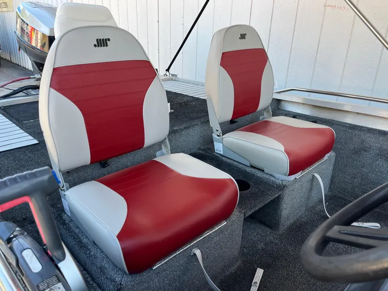 Slide: The Image of 1990 Bass Tracker Pro 17 boat with red and white seats. - 41