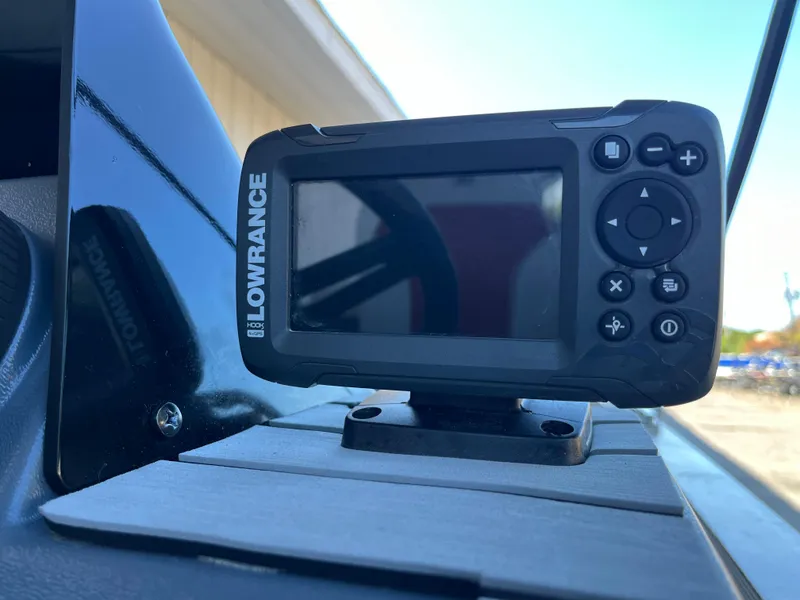 Slide: The Image of Lowrance fish finder on a 1990 Bass Tracker Pro 17 boat. - 42