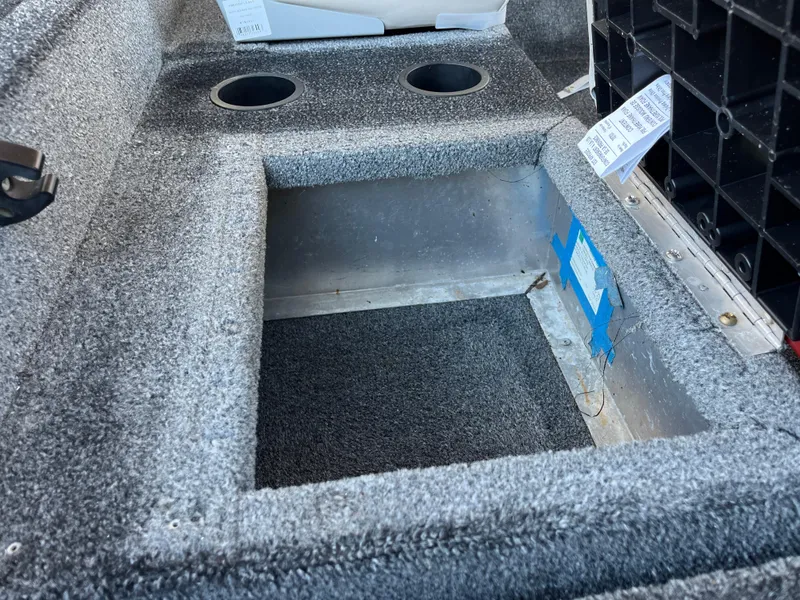 Slide: The Image of 1990 Bass Tracker Pro 17 boat interior storage compartment. - 43